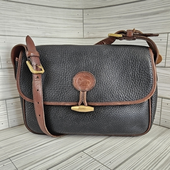 Dooney & Bourke Vintage All Weather Leather Toggle Satchel Saddle Bag in Black - Picture 1 of 17